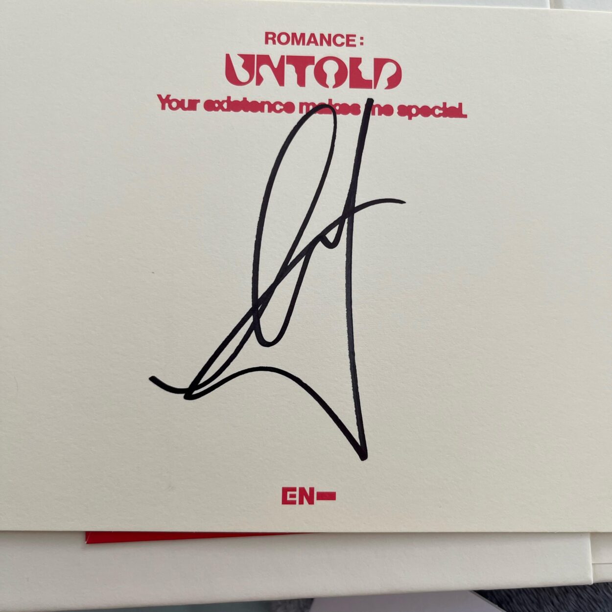 Which member’s signature is this?